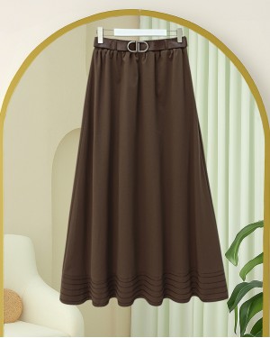 Imported soft gabardine skirt with hem stitching detail, elasticated waist, and lining. -Brown