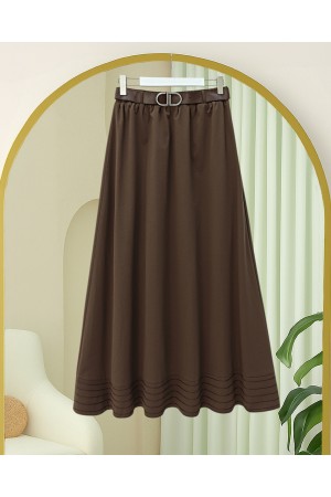 تنورة من قماش الجبردين الناعم المستورد بتفاصيل خياطة الحافة، وخصر مطاطي، وبطانة. -بنى