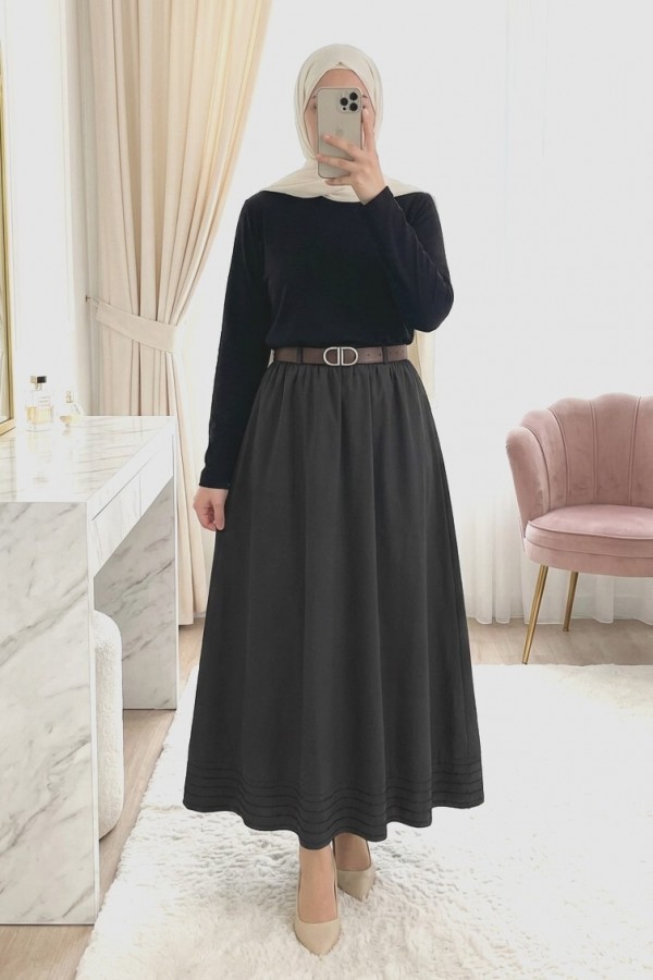 Imported soft gabardine skirt with hem stitching detail, elasticated waist, and lining. -Black