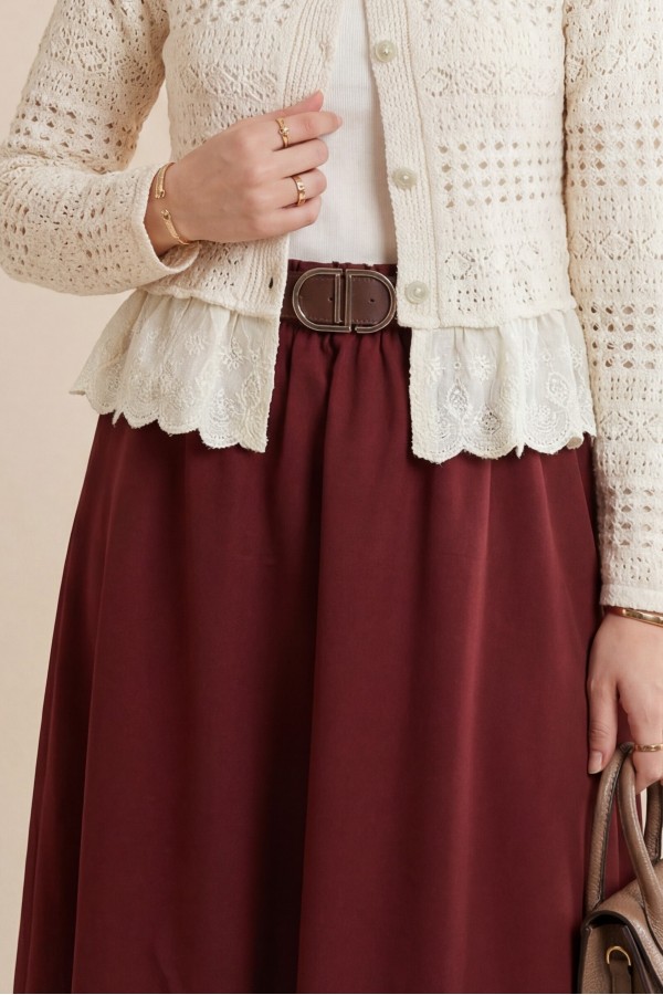 Imported soft gabardine skirt with hem stitching detail, elasticated waist, and lining.  -Maroon
