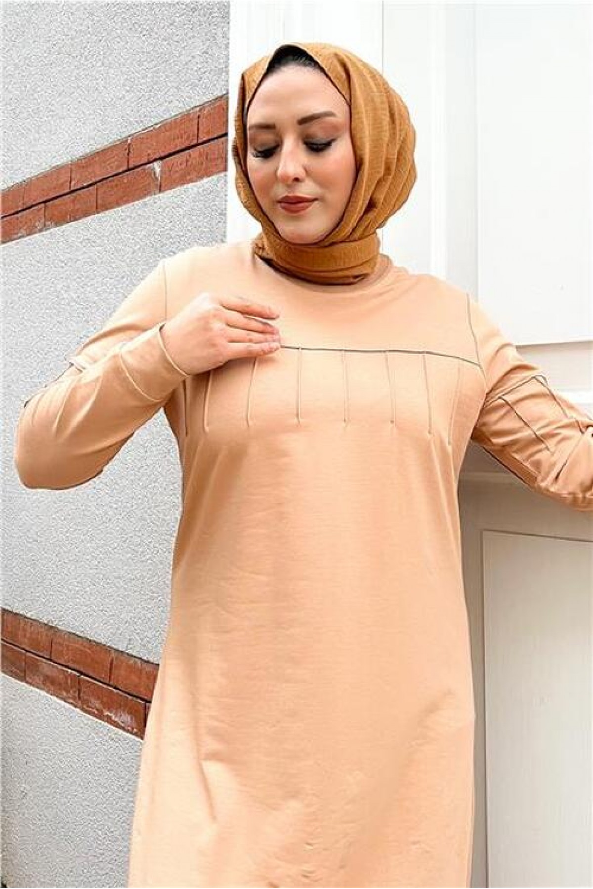 Short, simple, basic, long, plus-size sports dress with pleats.