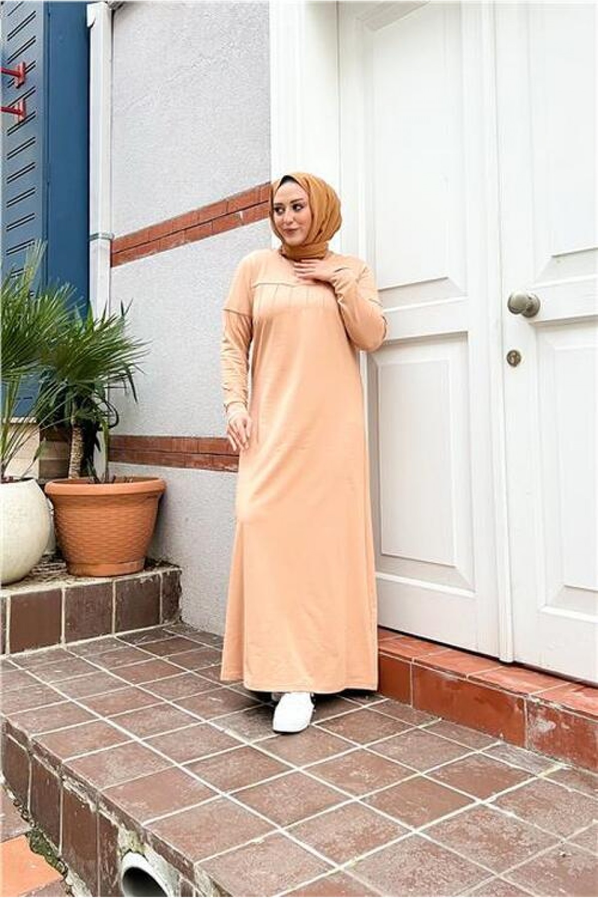 Short, simple, basic, long, plus-size sports dress with pleats.