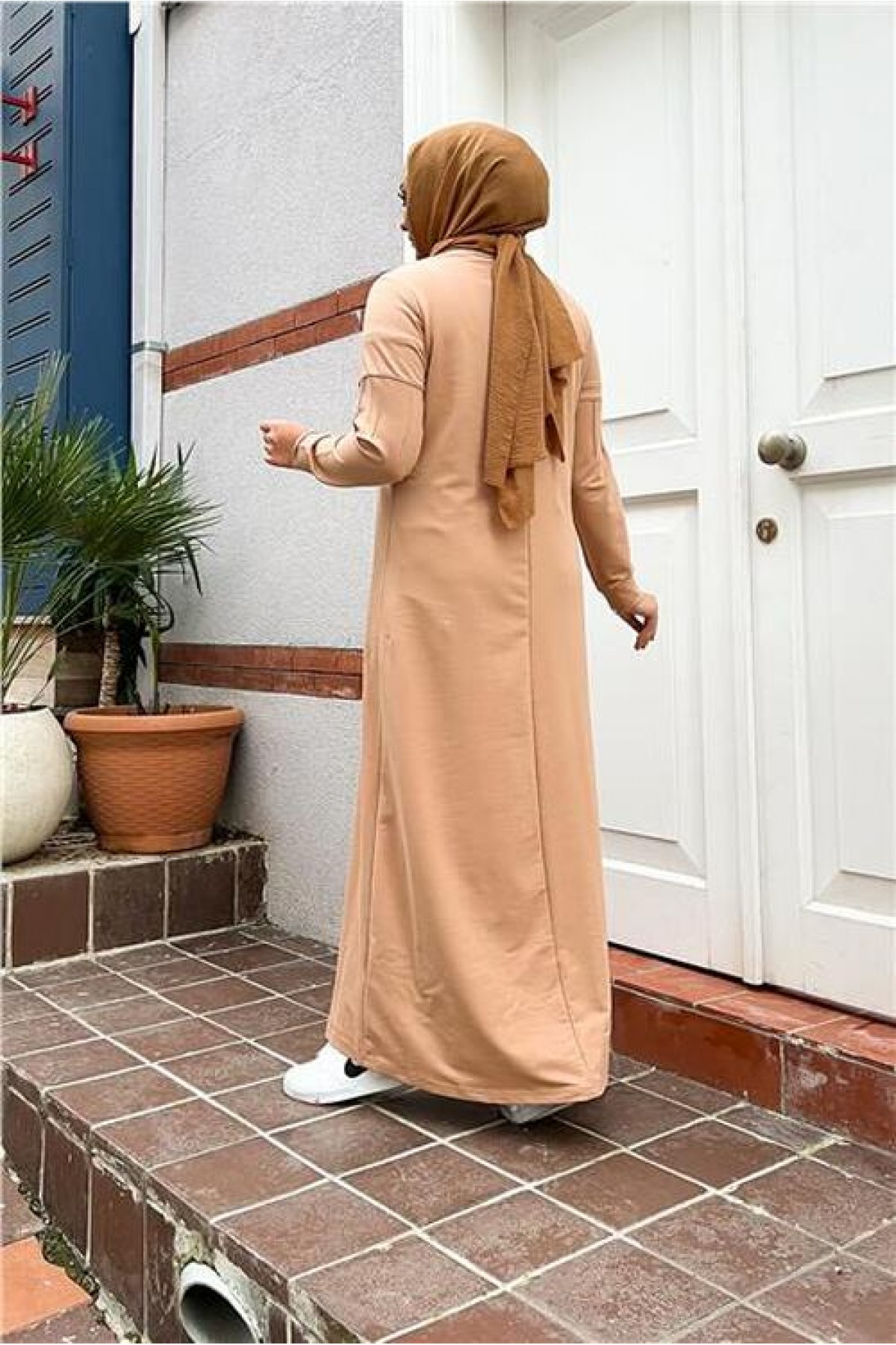 Short, simple, basic, long, plus-size sports dress with pleats.