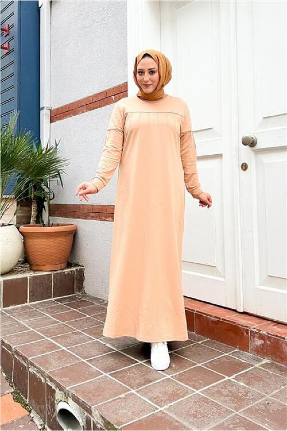 Short, simple, basic, long, plus-size sports dress with pleats.