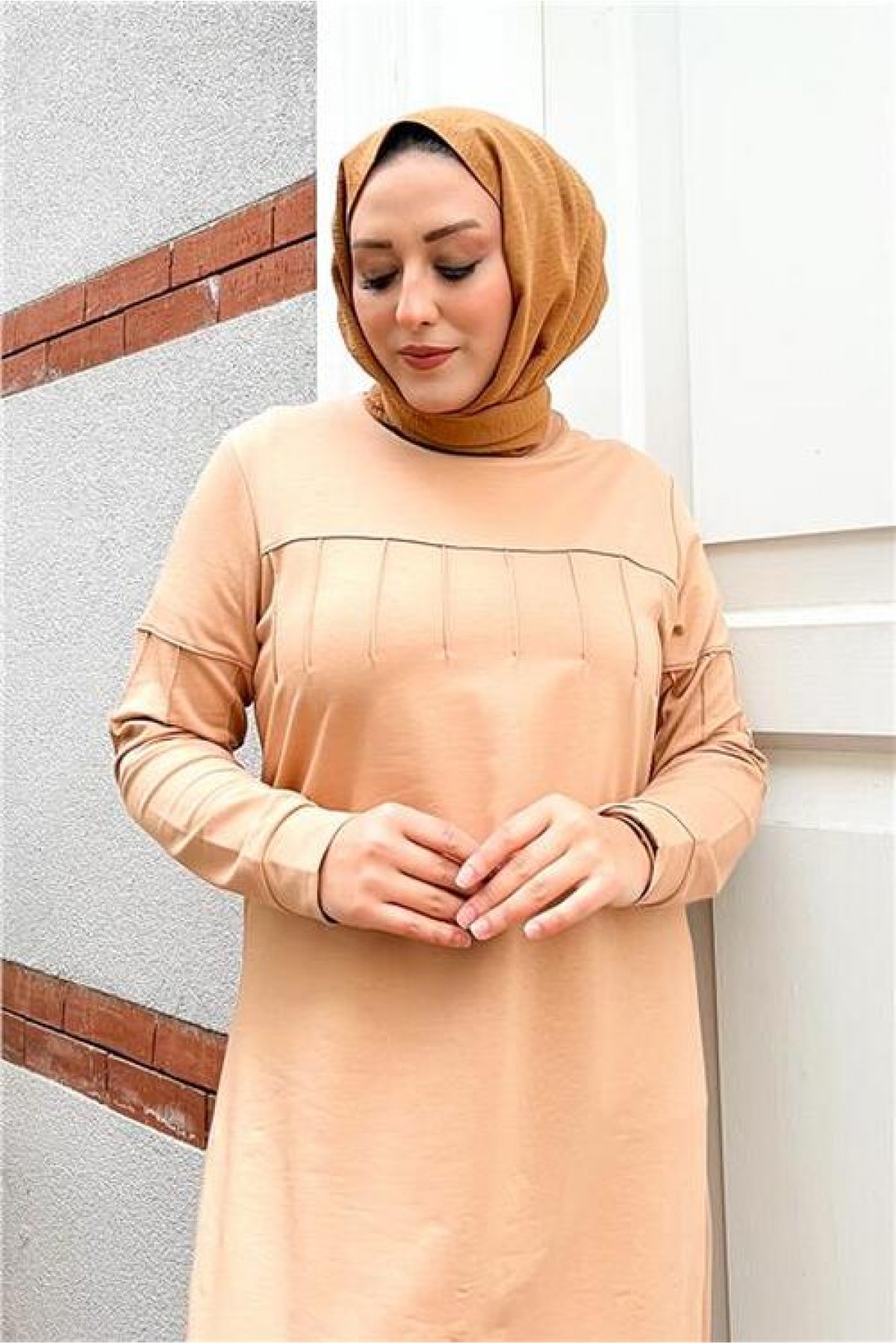 Short, simple, basic, long, plus-size sports dress with pleats.