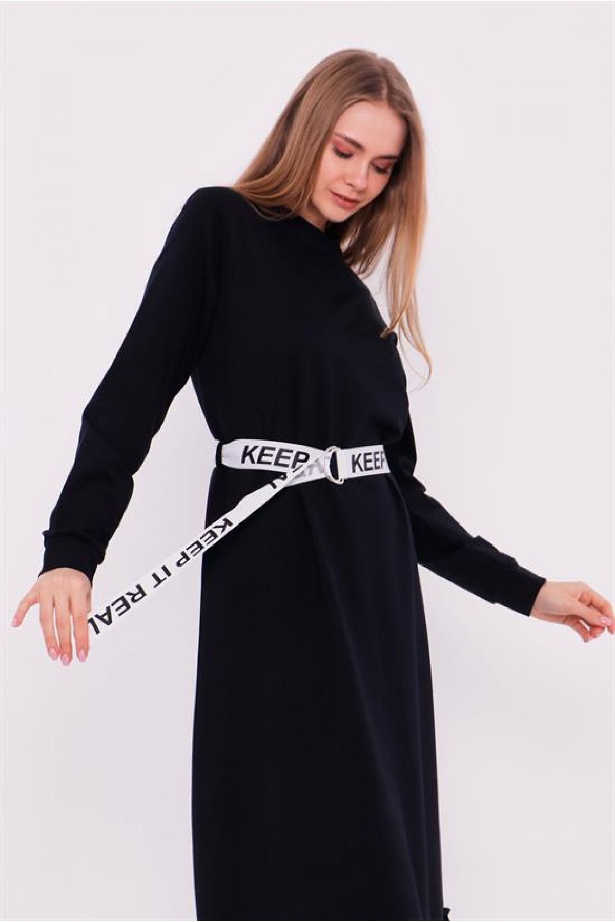 Moss-patterned, belted, and ruffle-detailed sports dress.