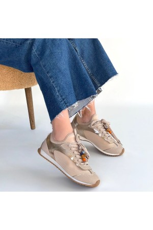 حذاء رياضي من الجلد البيج برباط من رياف