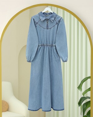 Denim dress with zipper closure, elasticated waist and cuffs, and pockets. -Ice Blue