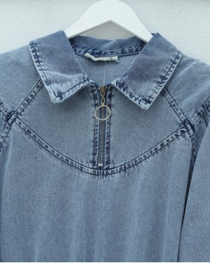 Denim dress with zipper closure, elasticated waist and cuffs, and pockets. -Ice Blue
