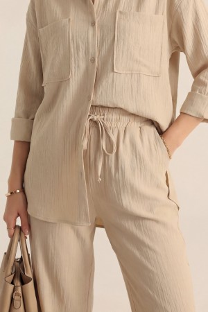 بدلة كتان مزدوجة مع جيب منفاخ  -اللون البيج