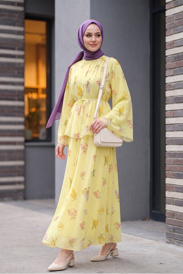 Spanish-style chiffon set with lined sleeves, belt, and floral skirt. -Yellow