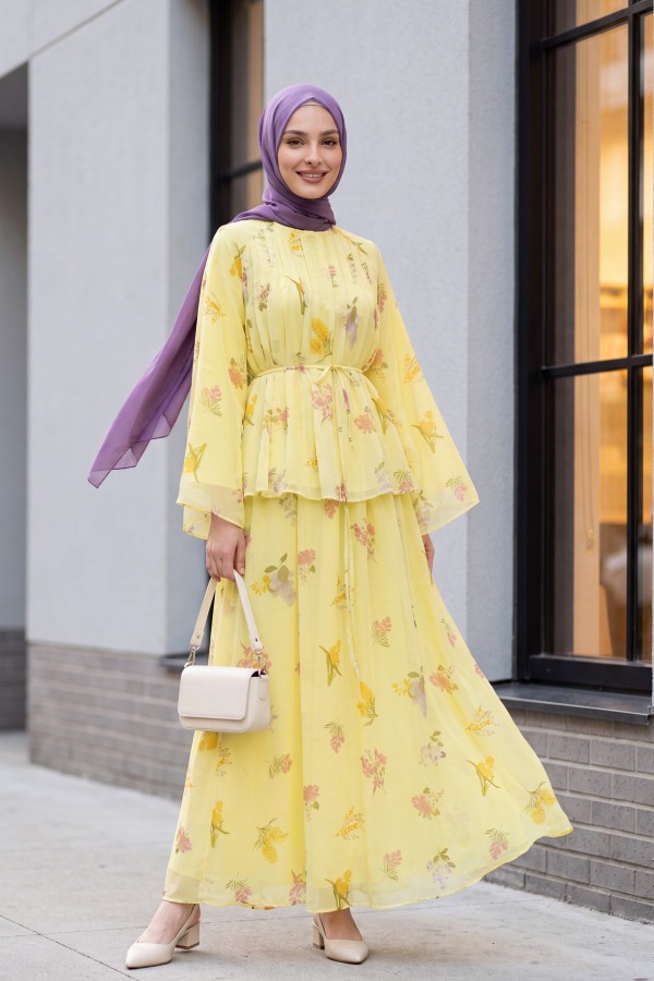 Spanish-style chiffon set with lined sleeves, belt, and floral skirt. -Yellow