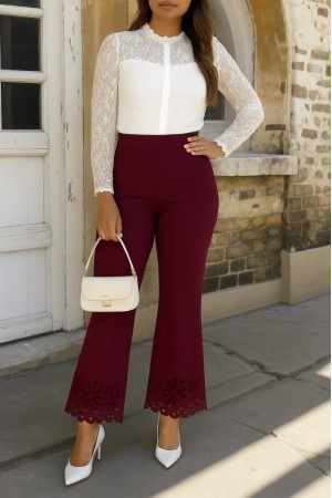 بنطلون نسائي من الكريب المستورد بتفاصيل مقصوصة بالليزر على شكل زهرة، بخصر مرتفع، ويتسع باتجاه الساق