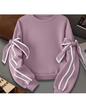 بلوزة نسائية بأكمام طويلة مزينة بتطريز وعقدة