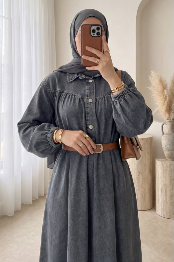 Half-buttoned denim dress with elasticated cuffs and belt. -Smoked 