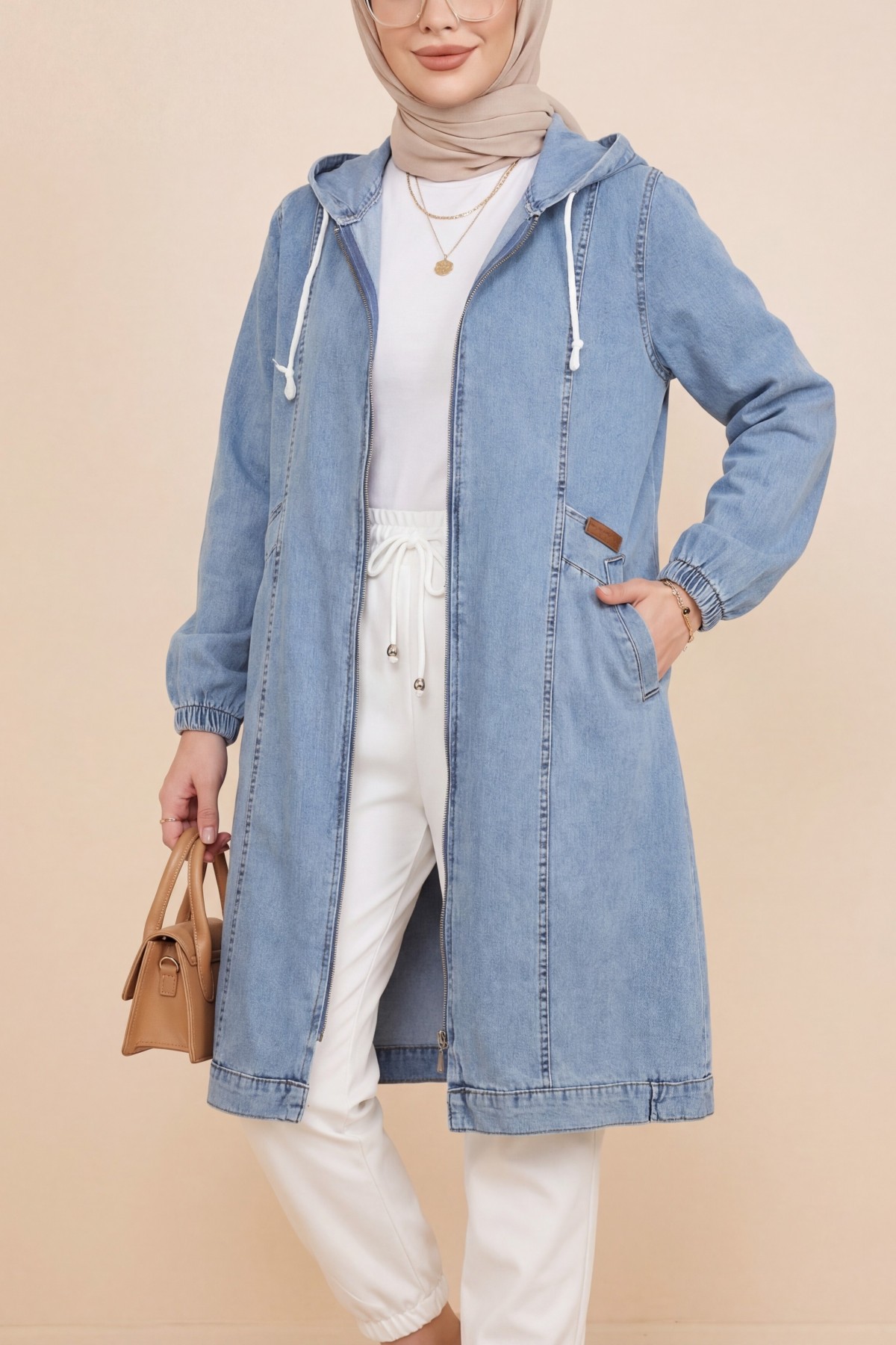 Hooded denim jacket with pockets, elasticated cuffs, and front zip closure. -Ice Blue