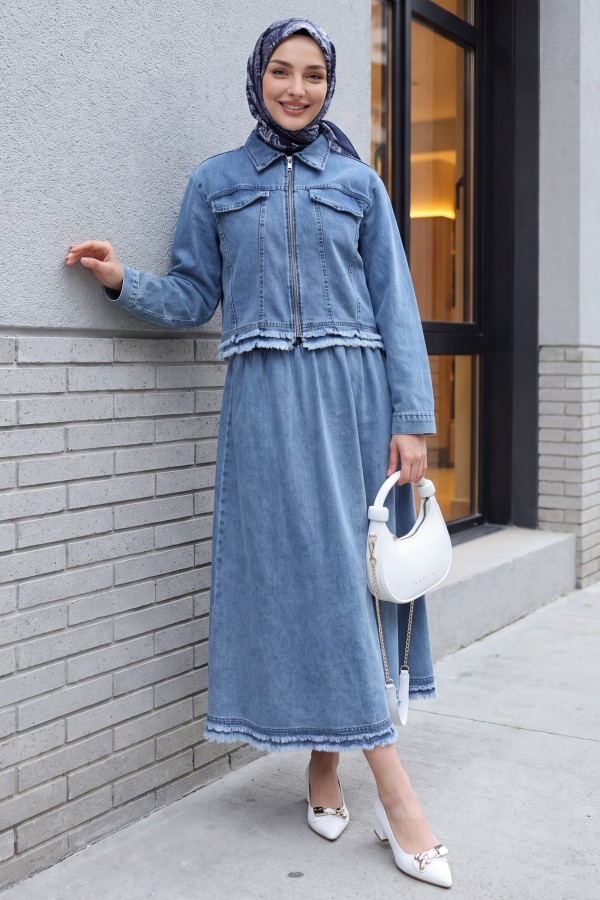 Denim suit with tassel detail, front zipper, and pocket detail. -Ice Blue
