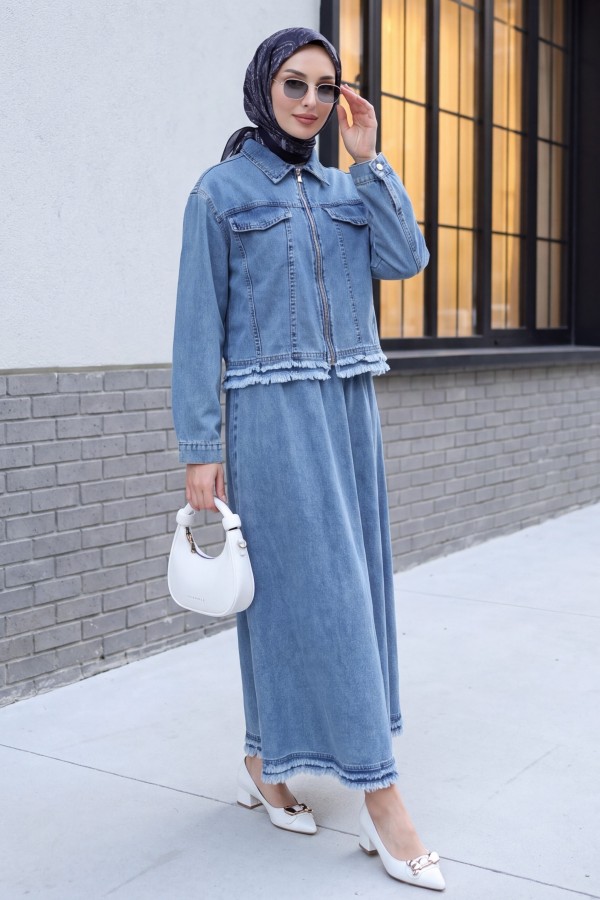 Denim suit with tassel detail, front zipper, and pocket detail. -Ice Blue