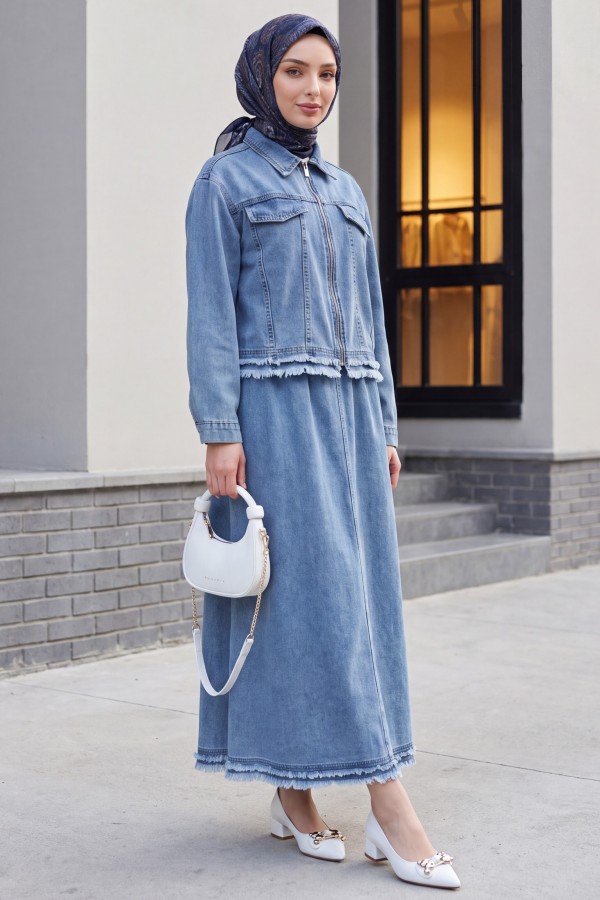 Denim suit with tassel detail, front zipper, and pocket detail. -Ice Blue