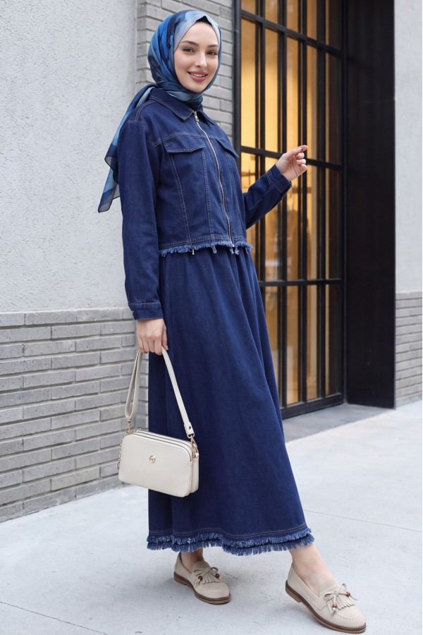 Denim suit with tassel detail, front zipper, and pocket detail. -Navy blue