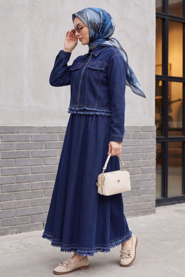 Denim suit with tassel detail, front zipper, and pocket detail. -Navy blue