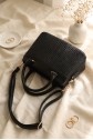 Long-strap, handle bag with knitted detail, zipper and snap closure. -Black