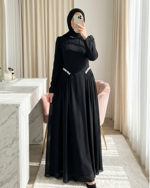 Crepe dress with rhinestone embellishments at the neckline and waist, and tulle details on the sides, now lined. -Black