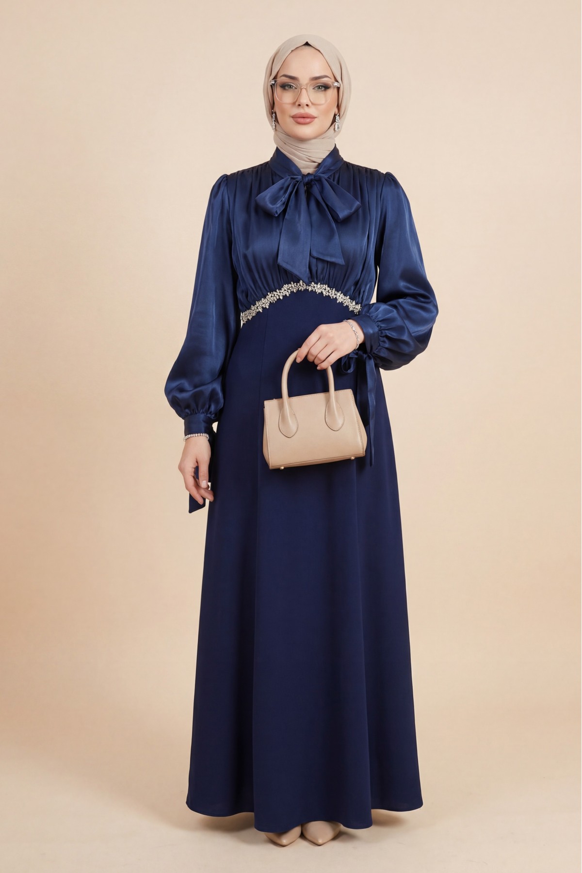 Pleated top with lace-up collar and sleeves, shimmering satin crepe skirt. -Navy blue