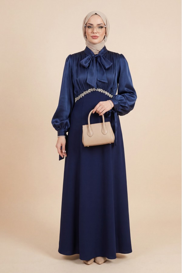 Pleated top with lace-up collar and sleeves, shimmering satin crepe skirt. -Navy blue