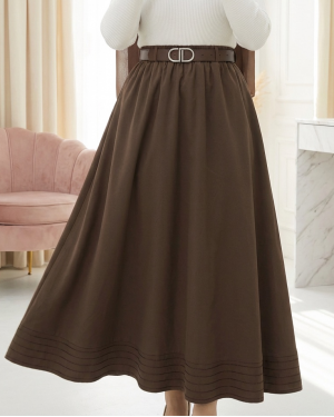 Imported soft gabardine skirt with hem stitching detail, elasticated waist, and lining. -Brown