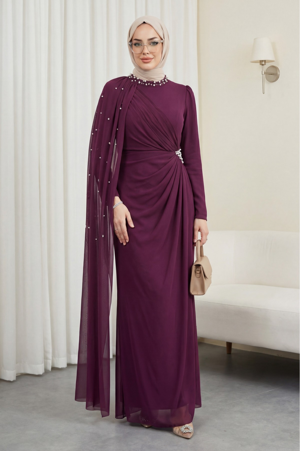 High-neck evening gown with pearl detail and tulle cape. -Damson