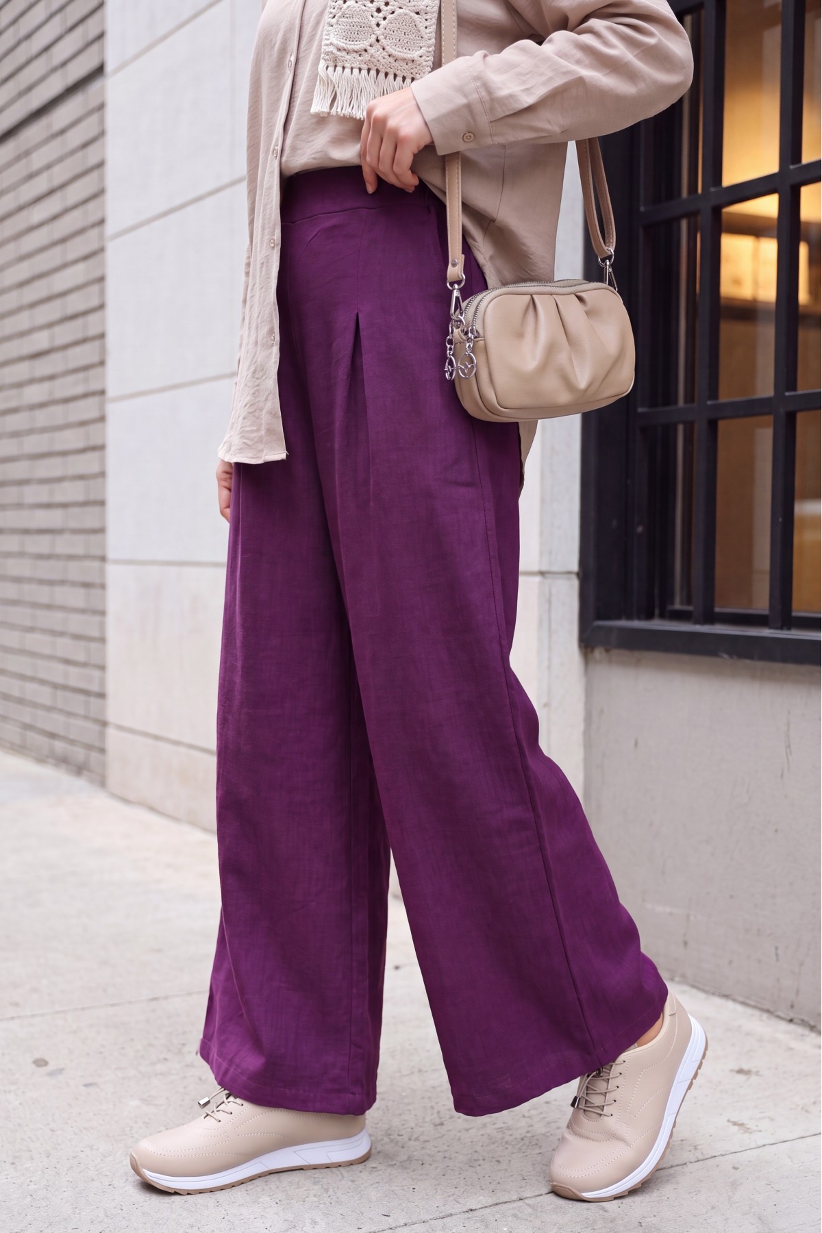 Wide-leg pleated linen-look trousers with elasticated waist. -Damson
