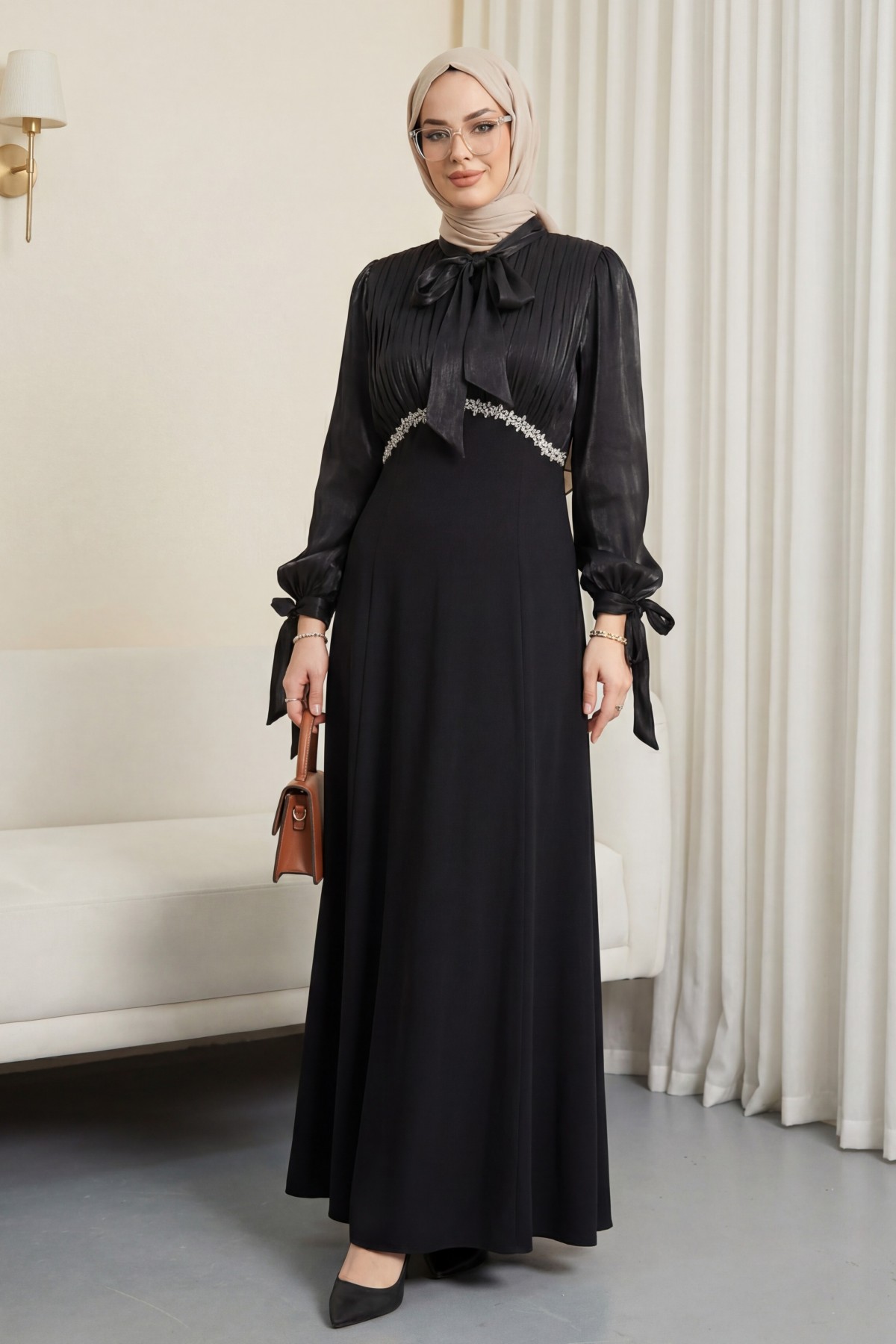 Pleated top with lace-up collar and sleeves, shimmering satin crepe skirt. -Black