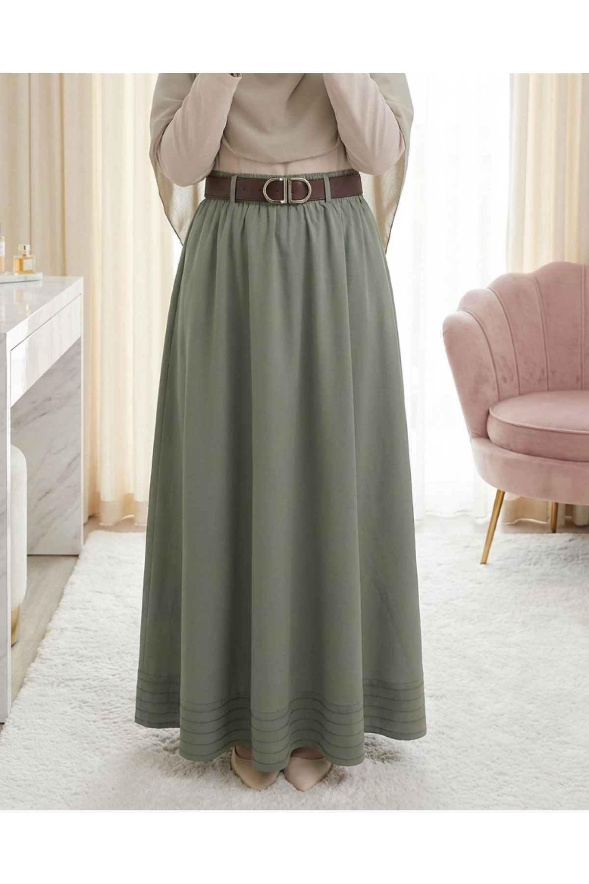 Imported soft gabardine skirt with hem stitching detail, elasticated waist, and lining. -Cagla Green