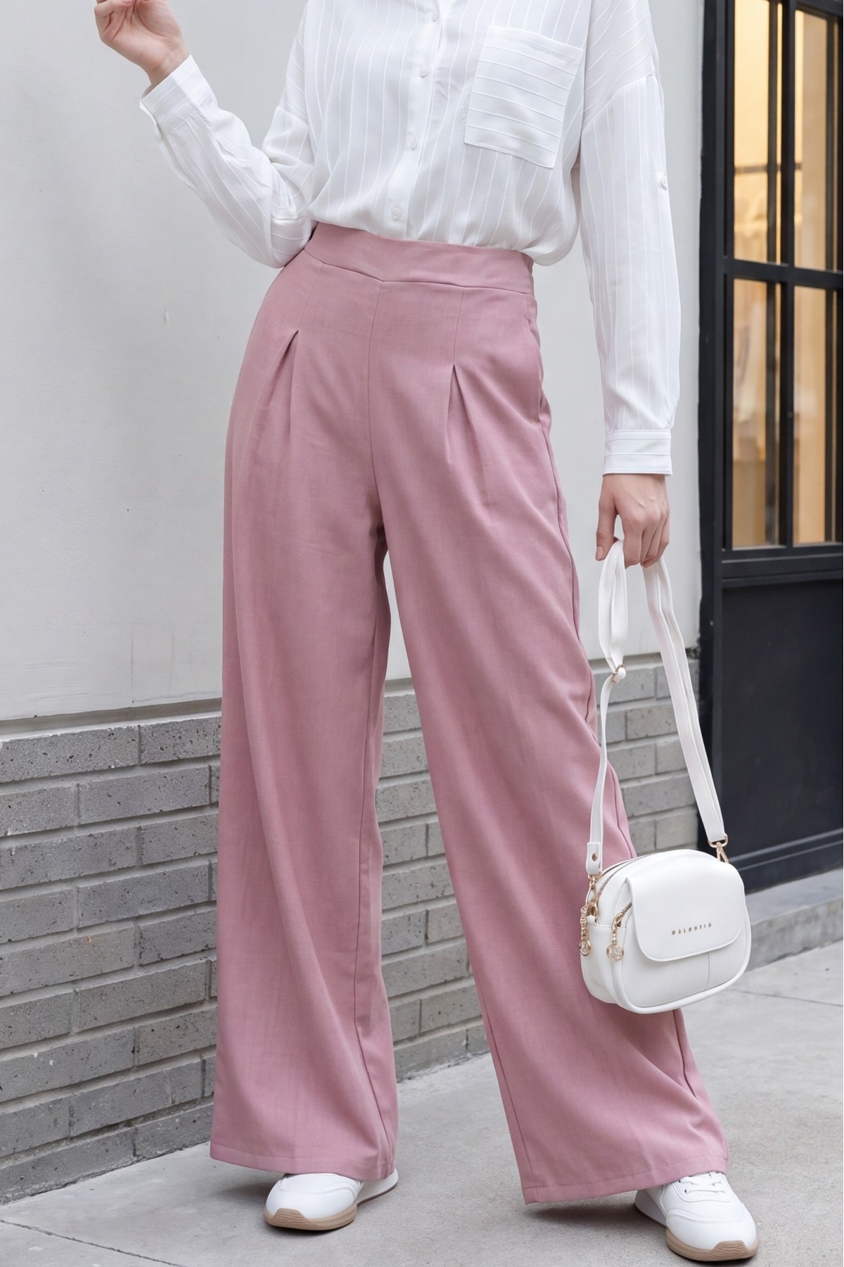 Wide-leg pleated linen-look trousers with elasticated waist. -Powder