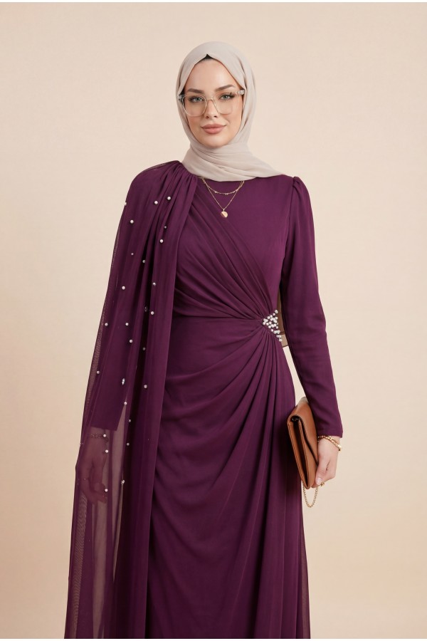High-neck evening gown with pearl detail and tulle cape. -Damson