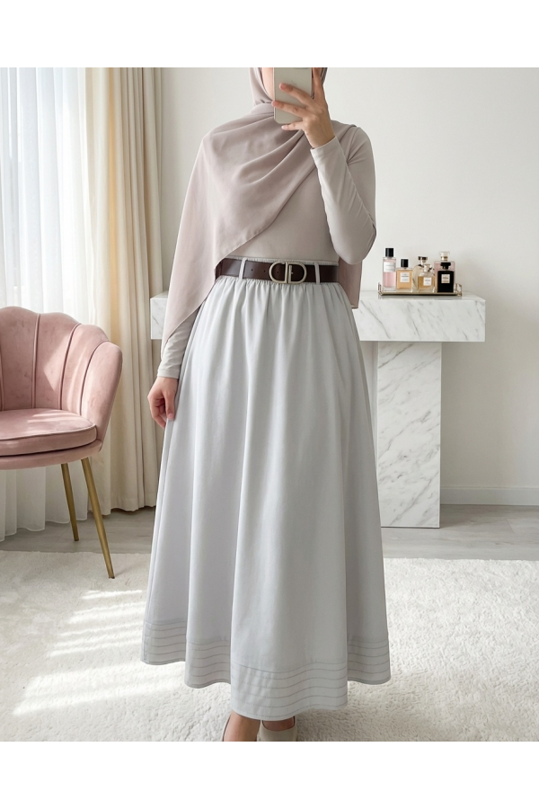 Imported soft gabardine skirt with hem stitching detail, elasticated waist, and lining. -Stone