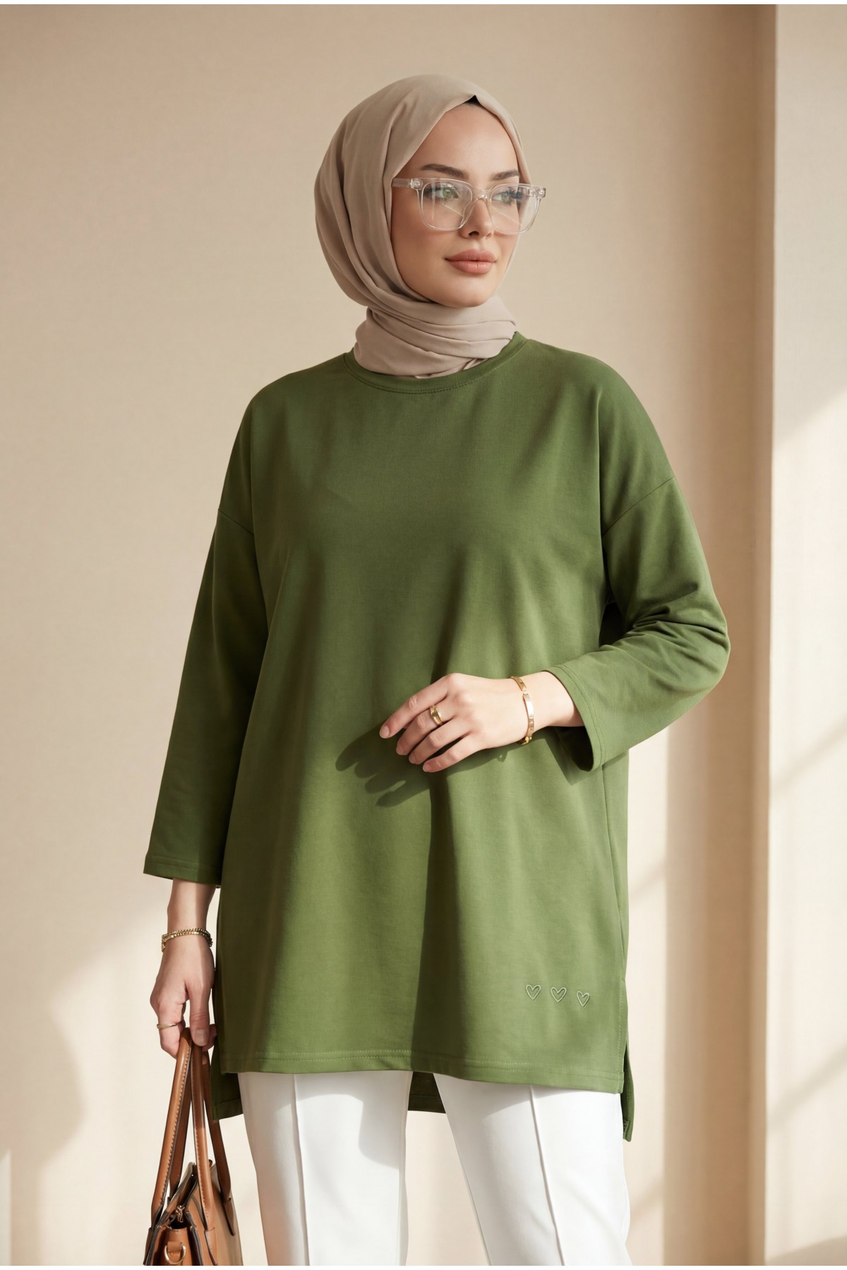 Loose-fitting cotton tunic with heart detail and slit at the hem. -Khaki