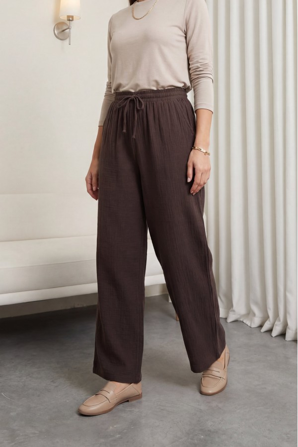 Wide-leg muslin trousers with elasticated waist and drawstring. -Brown
