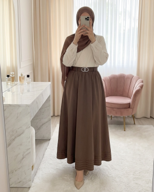 Imported soft gabardine skirt with hem stitching detail, elasticated waist, and lining. -Brown