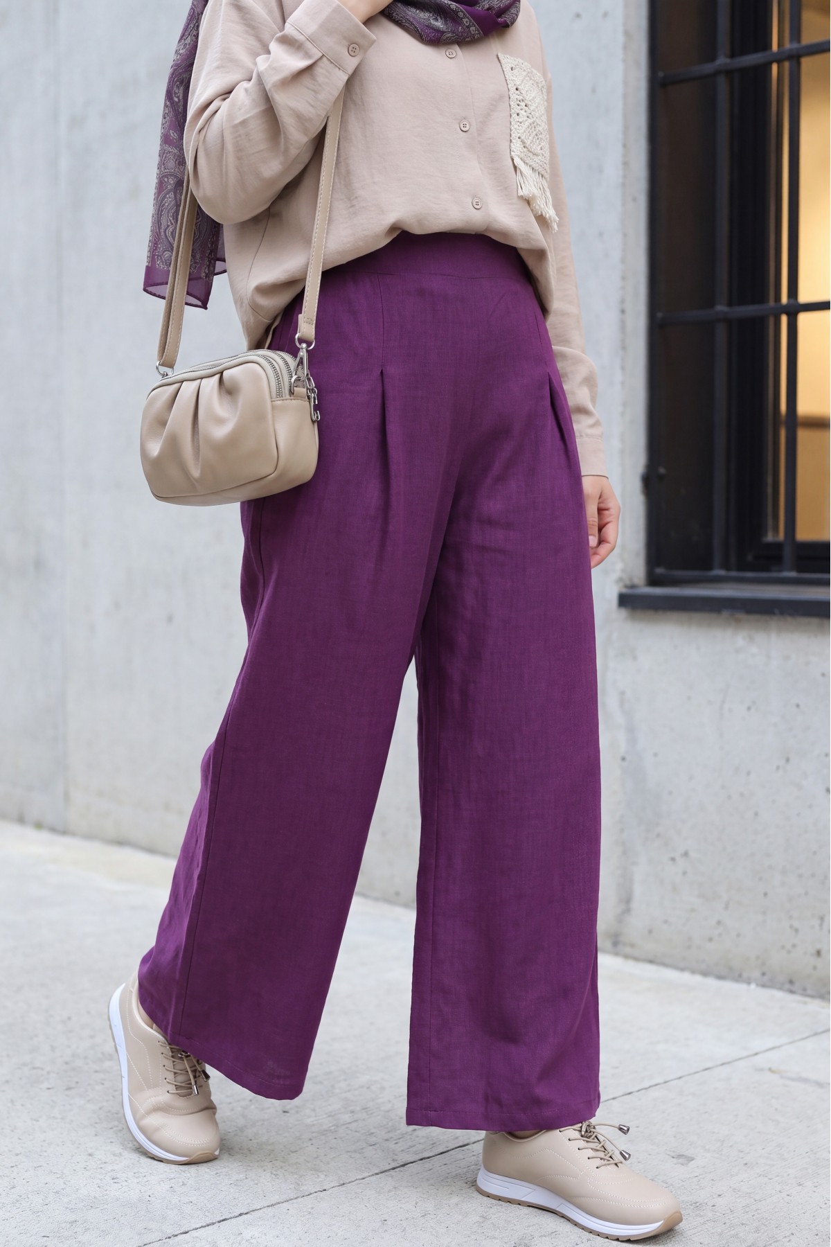 Wide-leg pleated linen-look trousers with elasticated waist. -Damson