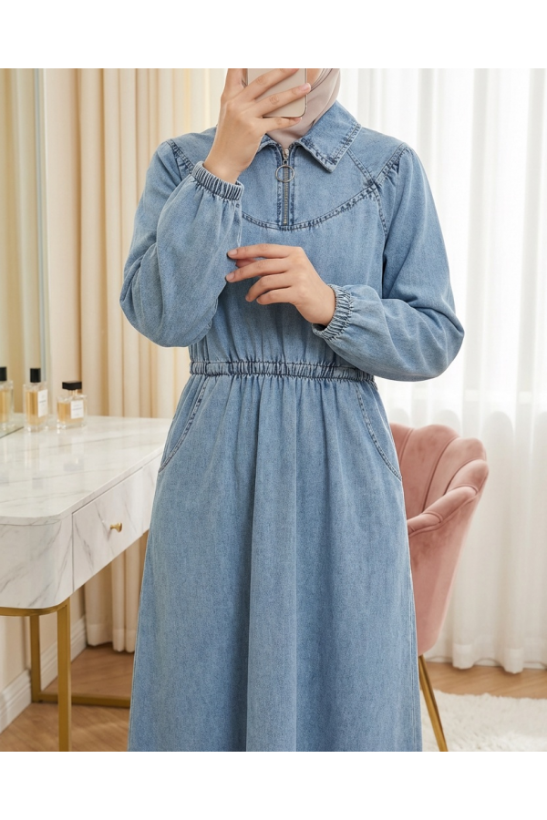 Denim dress with zipper closure, elasticated waist and cuffs, and pockets. -Ice Blue