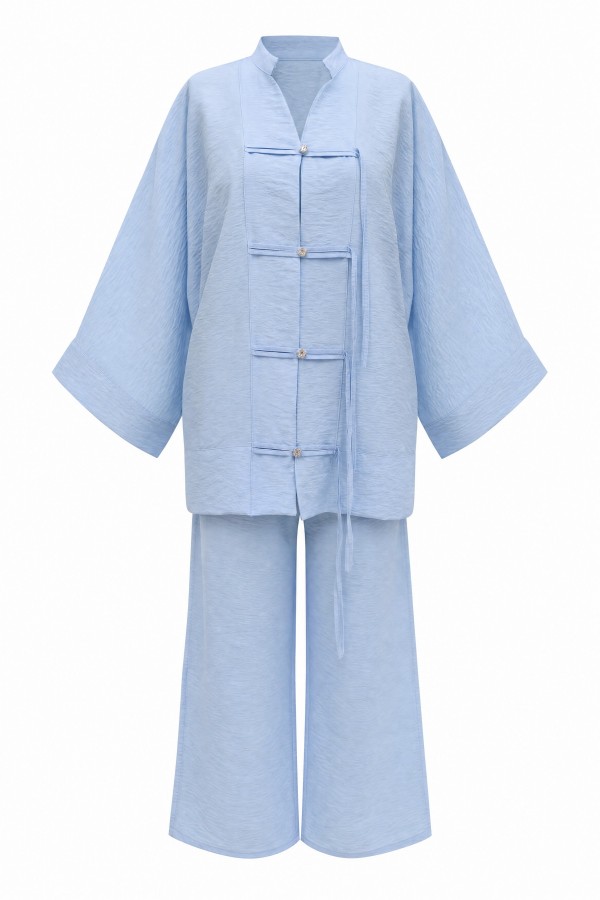 Loose-fitting Ayrobin suit with wide-sleeved trousers and button-down embellishments. -Baby Blue