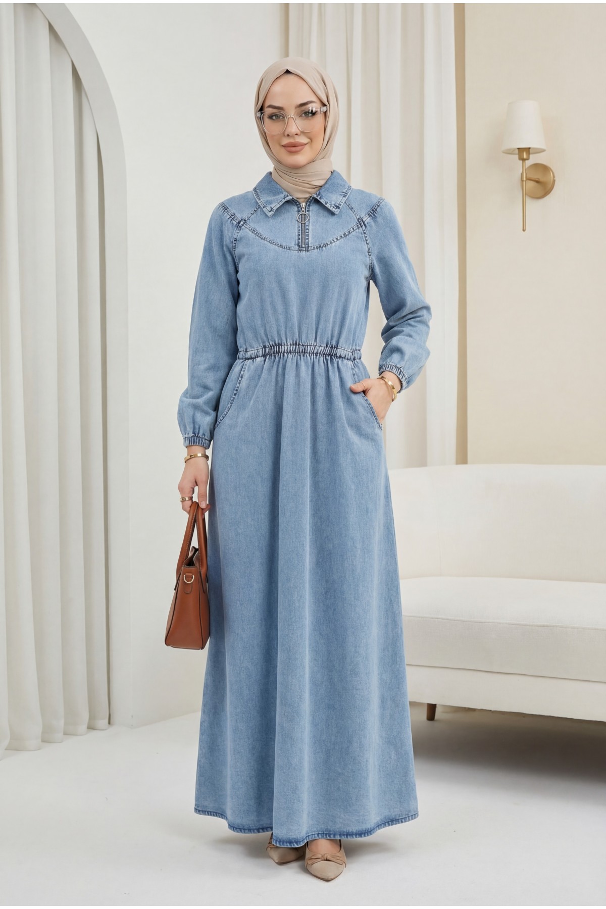 Denim dress with zipper closure, elasticated waist and cuffs, and pockets. -Ice Blue