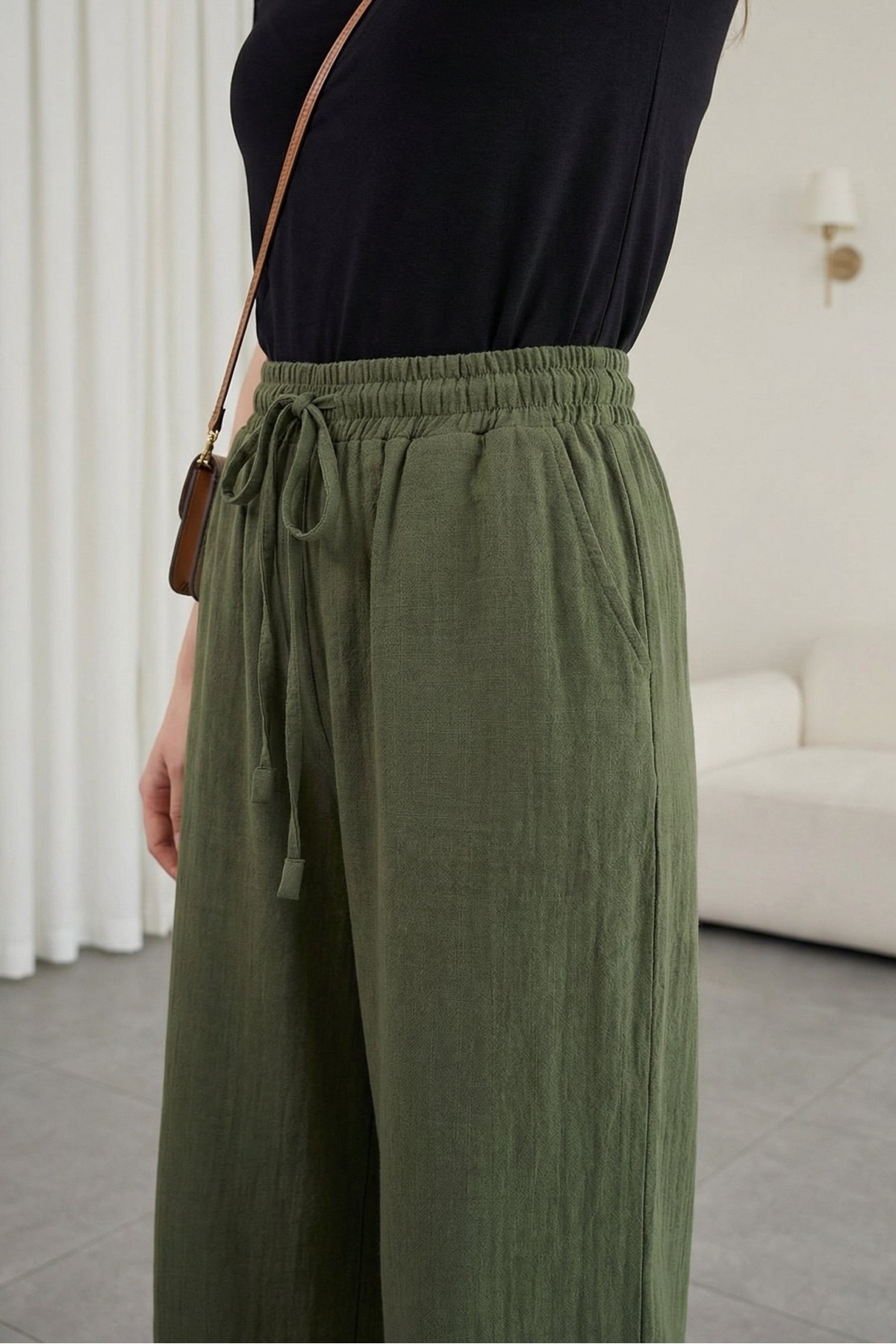 Wide-leg muslin trousers with elasticated waist and drawstring. -Khaki