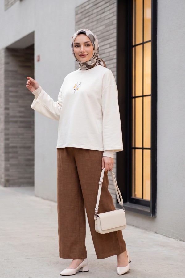 Wide-leg pleated linen-look trousers with elasticated waist. -Brown