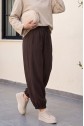 Modal trousers with elasticated waistband, pockets, and drawstring. -Brown