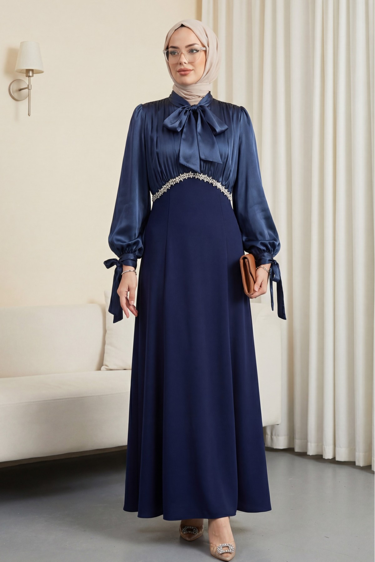 Pleated top with lace-up collar and sleeves, shimmering satin crepe skirt. -Navy blue