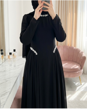 Crepe dress with rhinestone embellishments at the neckline and waist, and tulle details on the sides, now lined. -Black