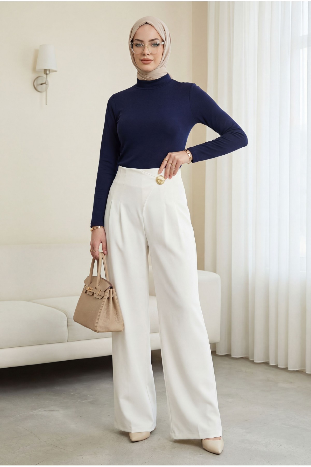 Wide-leg crepe trousers with side zipper, brooch, and folding detail. -White